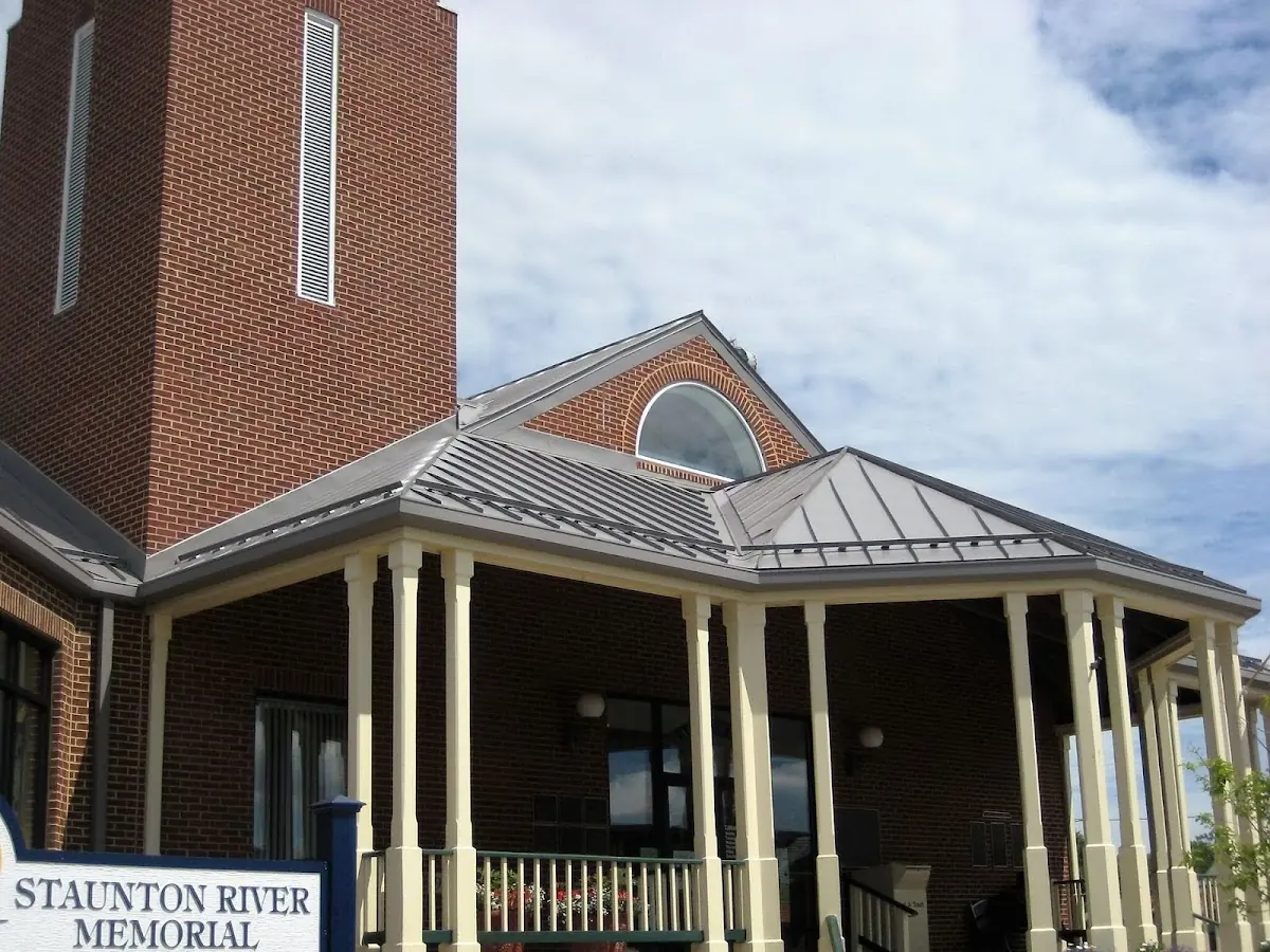 Skilled roofing craftsmen working on a residential roof in Winters Run